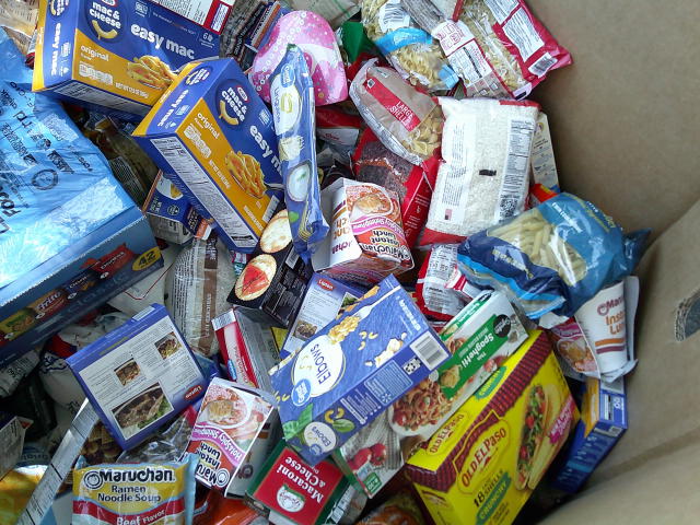Food that can easily be crushed in a cardboard container.